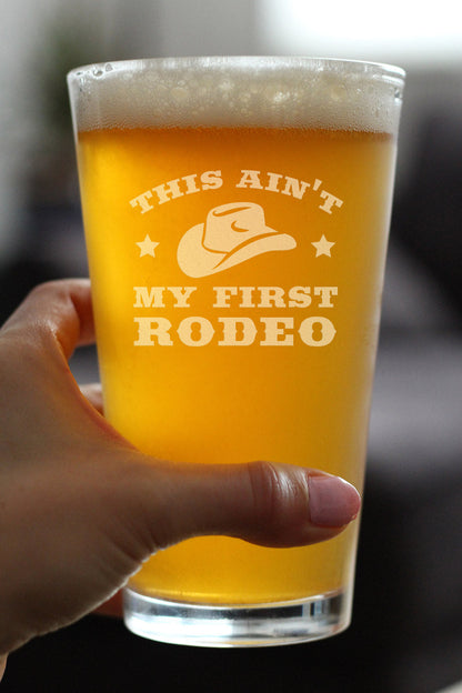 Ain't My First Rodeo - Pint Glass for Beer - Funny Cowboy or Cowgirl Gifts for Men & Women - Fun Unique Party Decor Cup